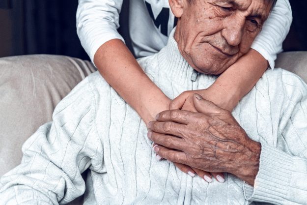 Daughter supports and takes care of her elderly father during qu stay home longer to age-in-place