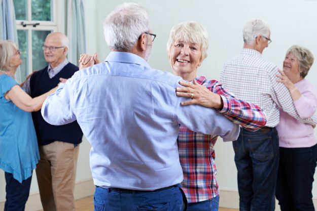 Group Of Seniors Enjoying Dancing Club Together Group Of Seniors Enjoying Dancing Club Together