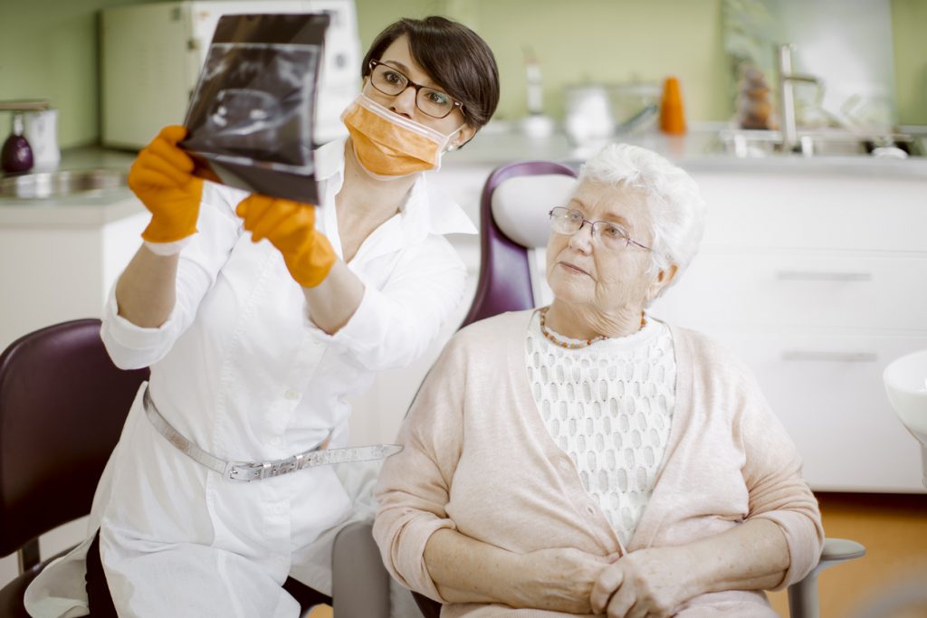 Senior woman at the dentist. Ageism and dental care concept