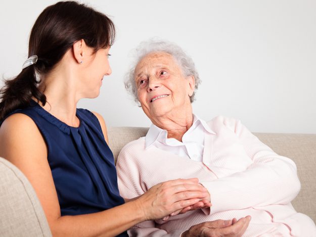 Senior woman and caregiver caregivers and home health aides
