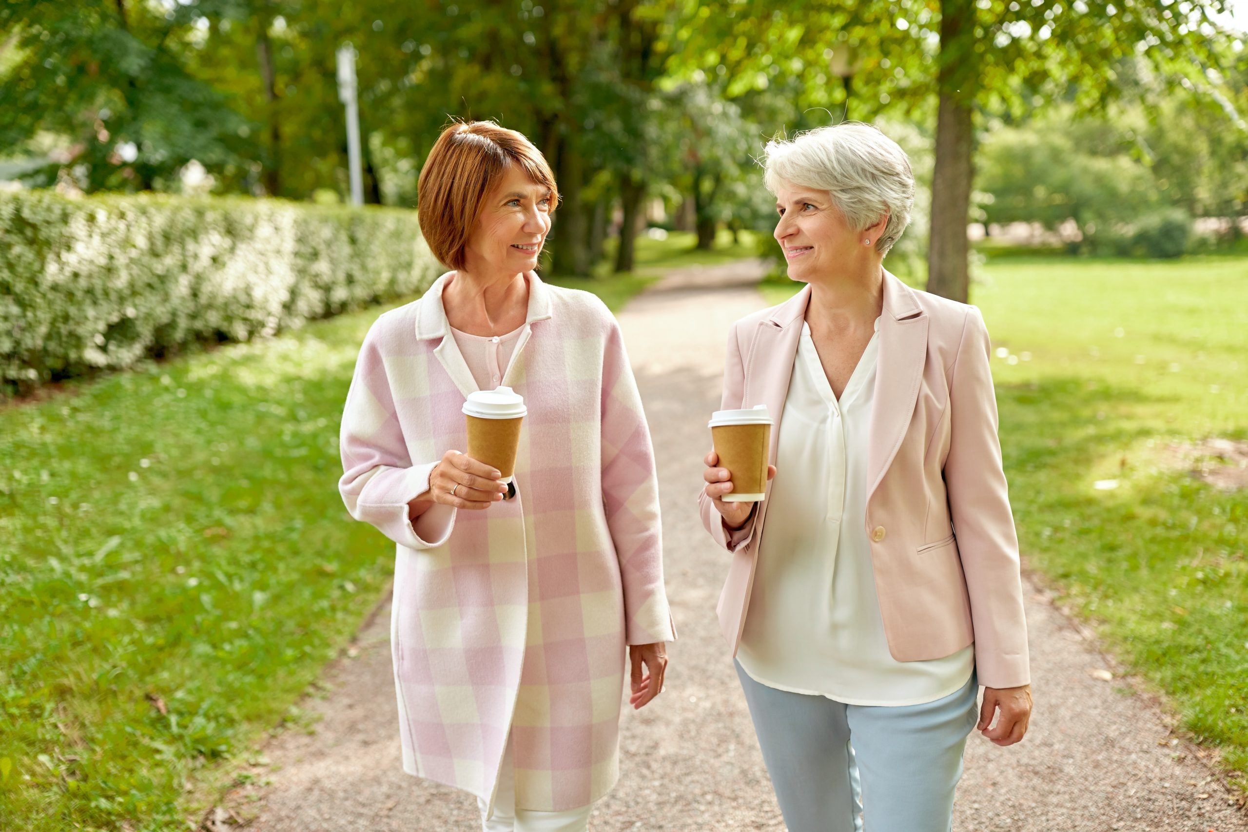 senior women or friends drinking coffee at park tips to keep the caregiver happy