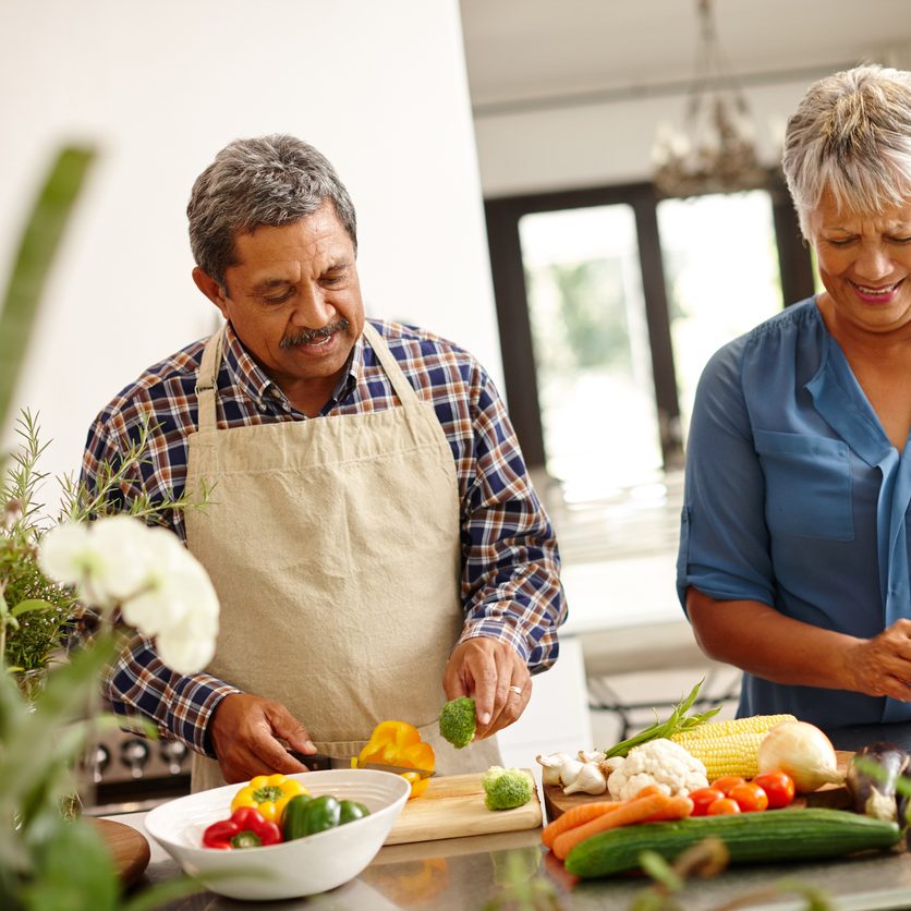 Senior weight loss diets in Bayside; a senior couple cooking a healthy meal together.