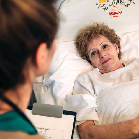 Female doctor with senior HIV patient in Pelham Parkway; HIV treatments in Pelham Parkway.